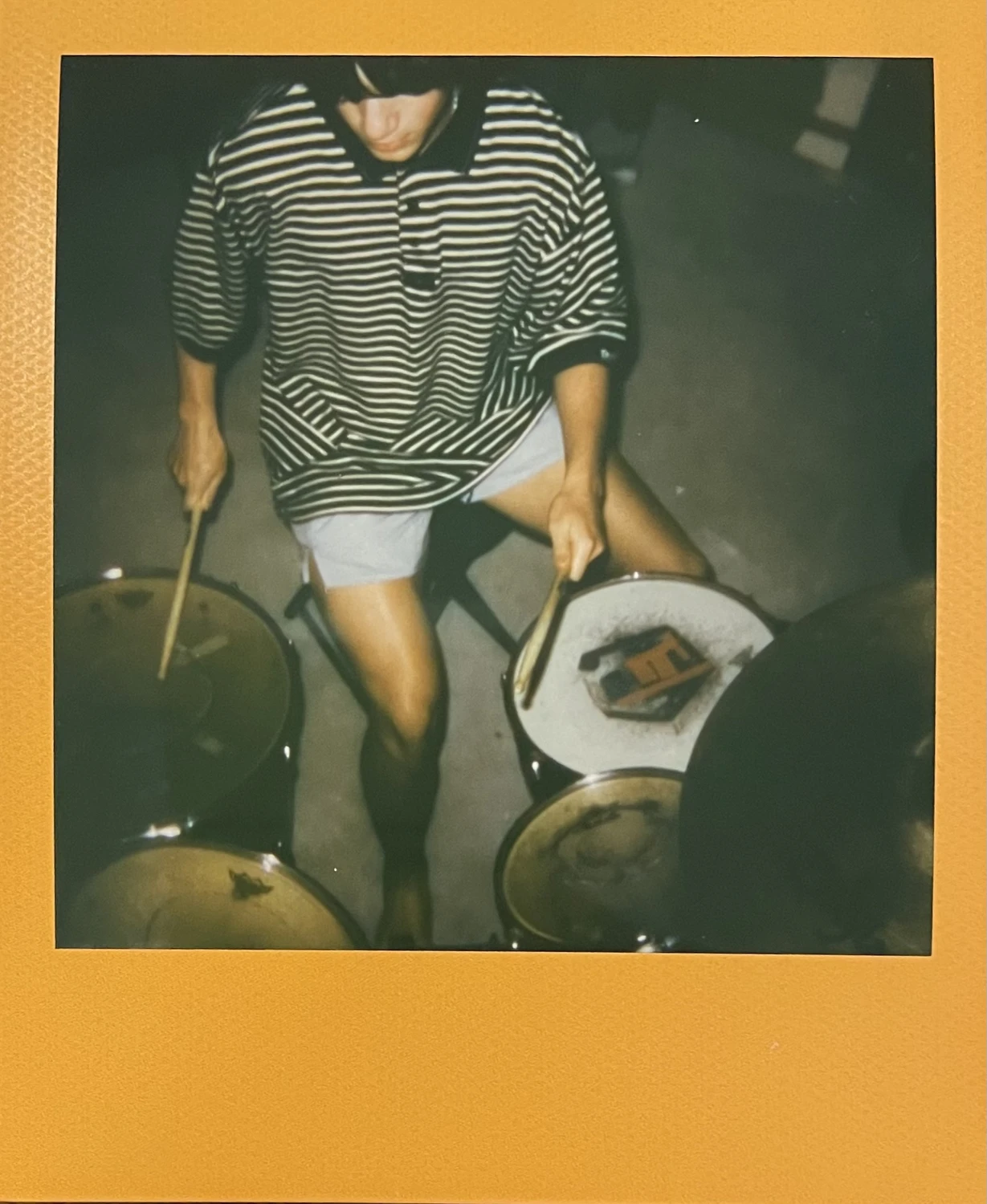 Liam Drumming shot on Polaroid 600 with a Polaroid Sun 600, by austinanalog