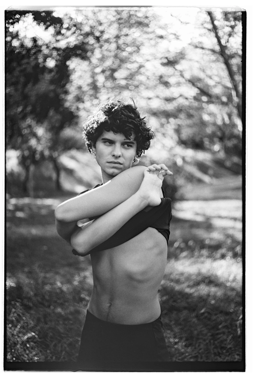 Boy shot on Fujifilm Neopan Acros 100 II with a Contax 167MT, by Samuel Ferreira