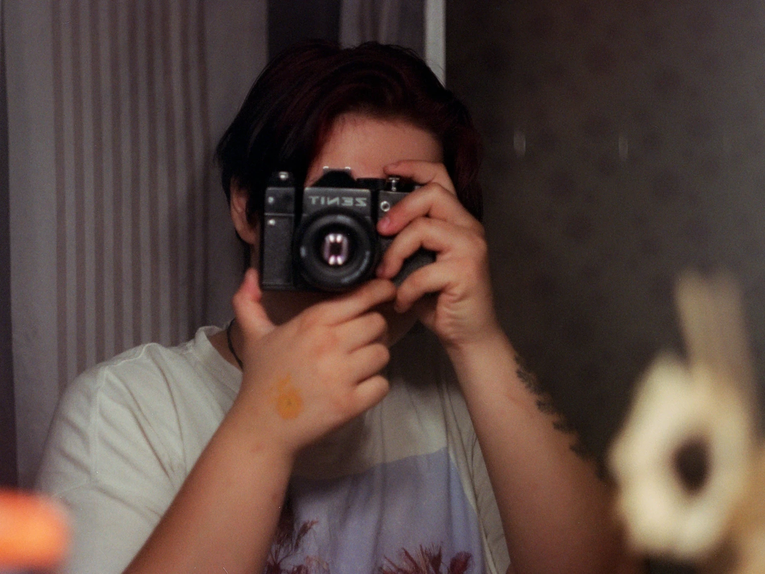 Self-portrait shot on Kodak Gold 200 with a Zenit 12, by Nika