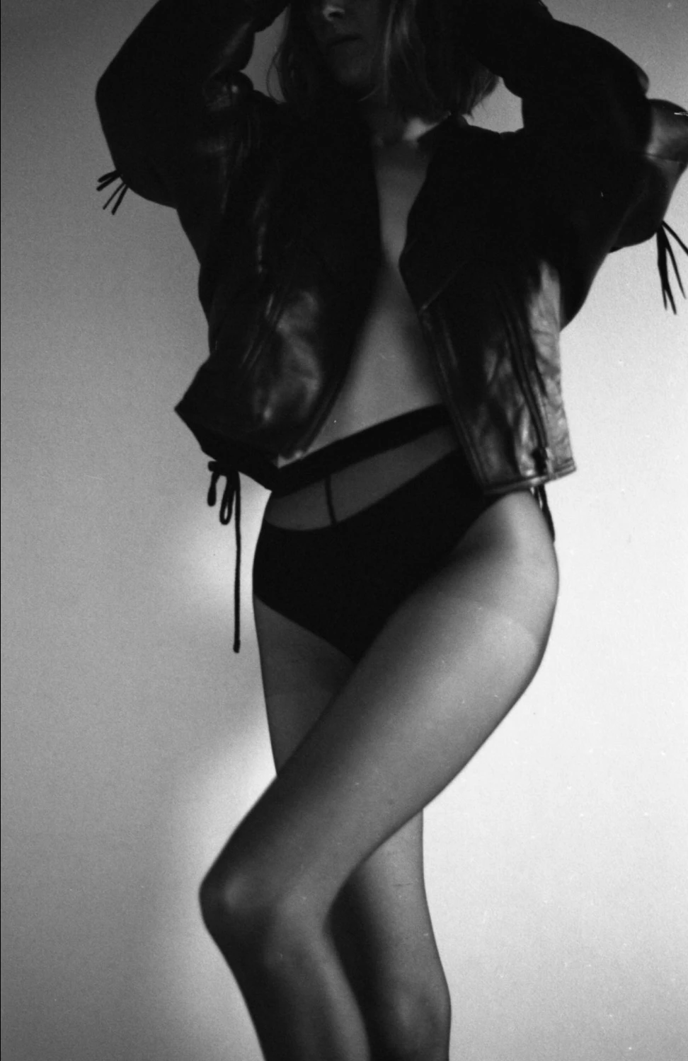Black leather coat shot on Ilford Delta 400 with a Minolta, by Sanja Lesniowska