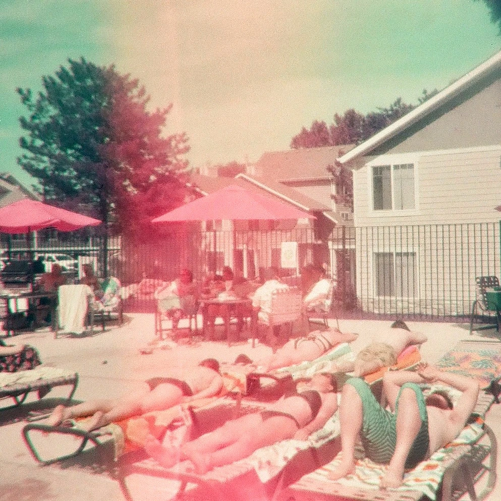 Pool day ⛱ shot on Lomography LomoChrome Purple 100 with a Lomo Simple Use, by Becca