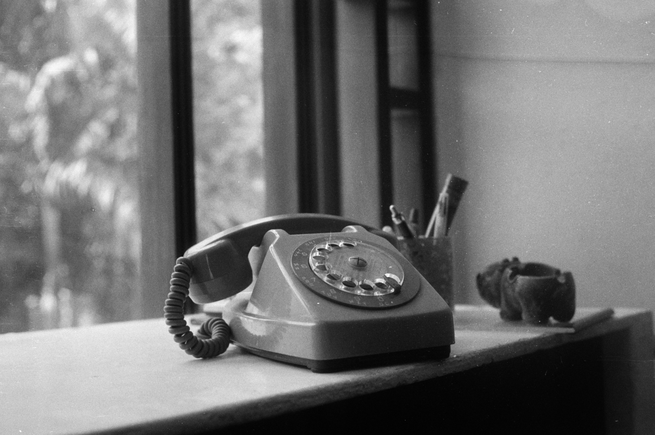 A window through the past shot on Agfa APX 100 with a Canon Canonet QL19, developed at Chambre Noire, by Kevin Amlaman