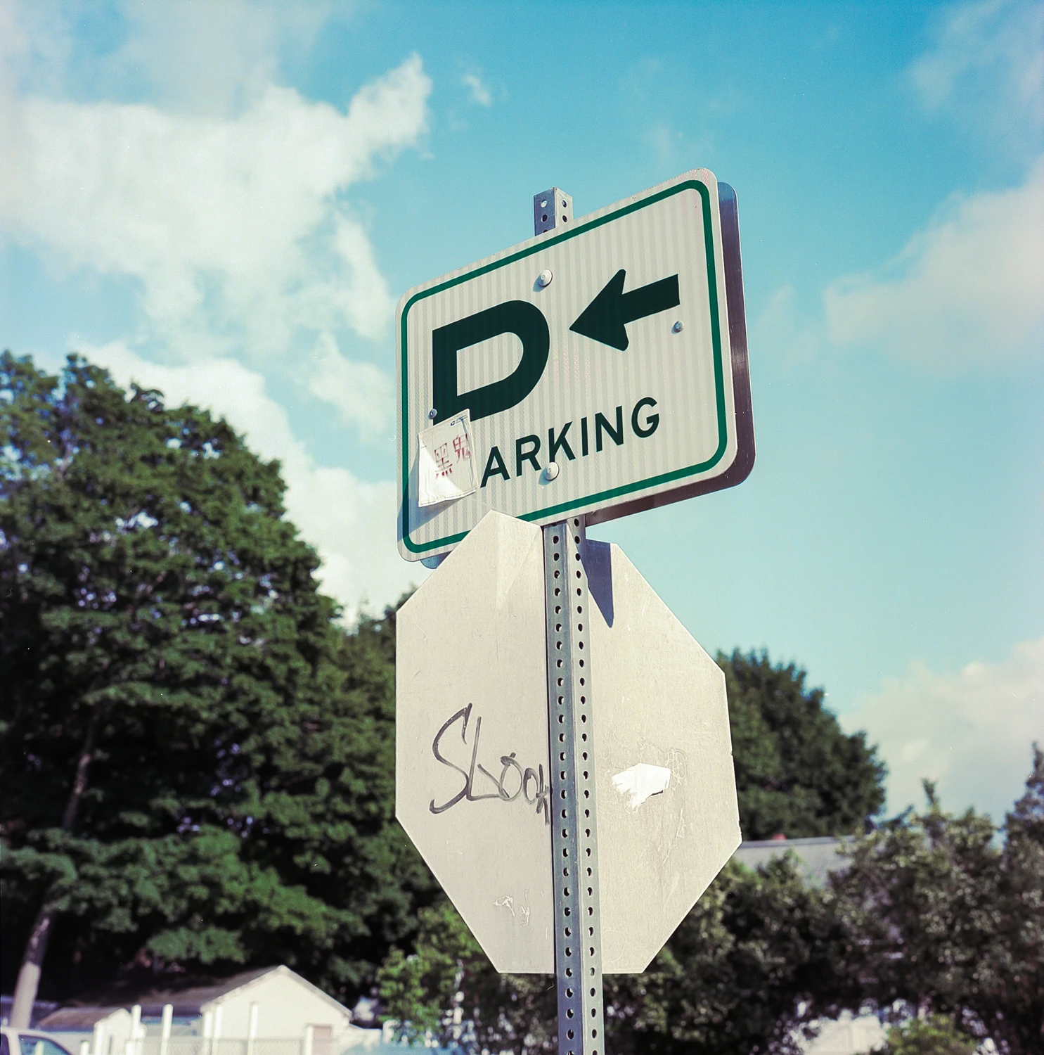 Parking shot on Kodak Portra 160 with a Zenza Bronica SQ2, by Patrick Hennessy