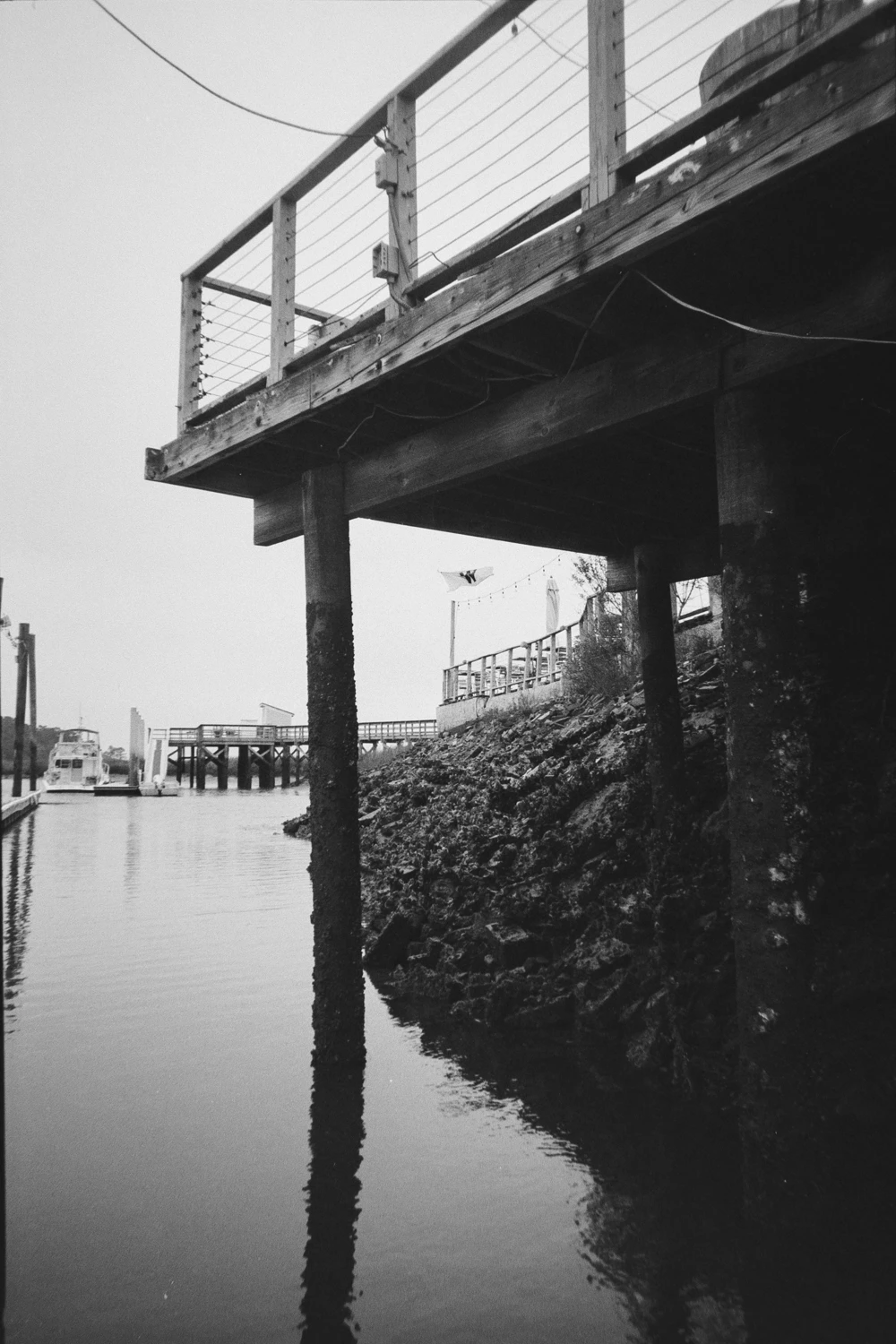 Under the Dock shot on Ilford Delta 100 with a Yashica AW Mini, by Cole