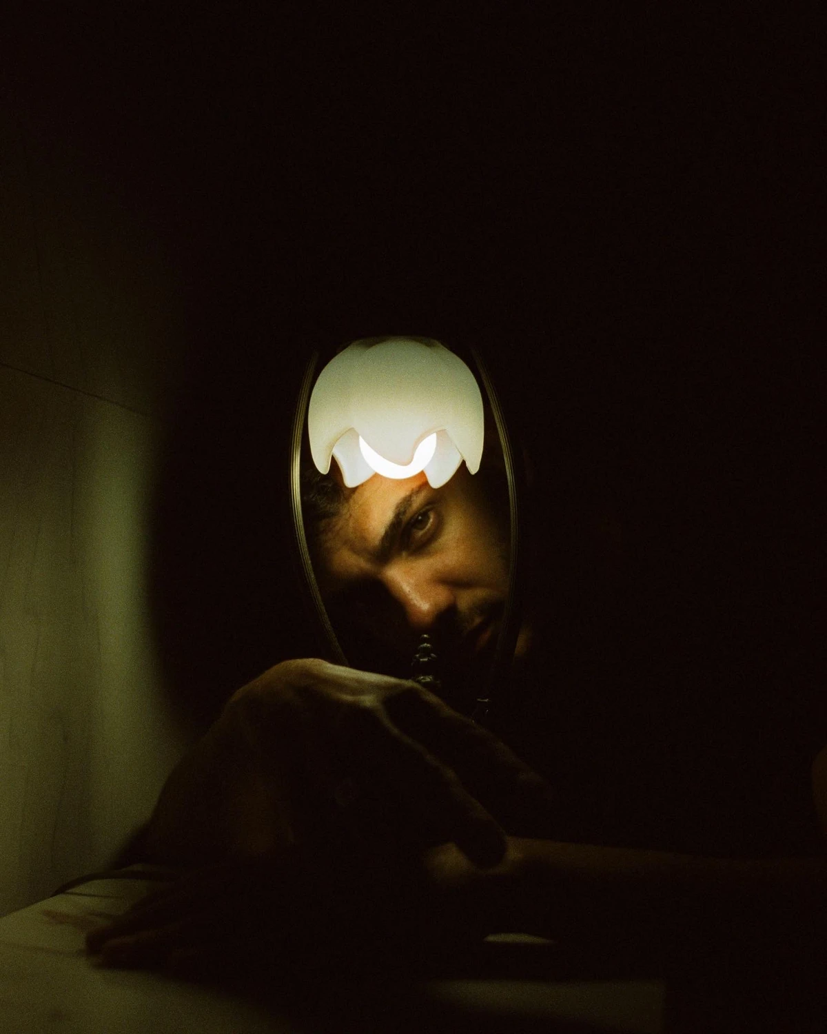a moment in the dark… shot on Cinestill 800T with a Nikon FM3, by sara mckinnon