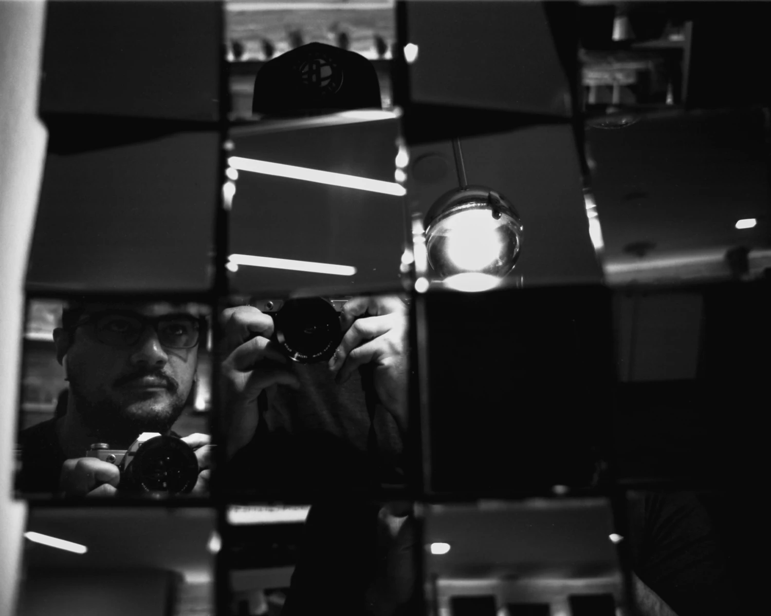 Fractured Self-Portrait shot on Rollei RPX 25 with a Canon AE-1, by Michael Trimboli