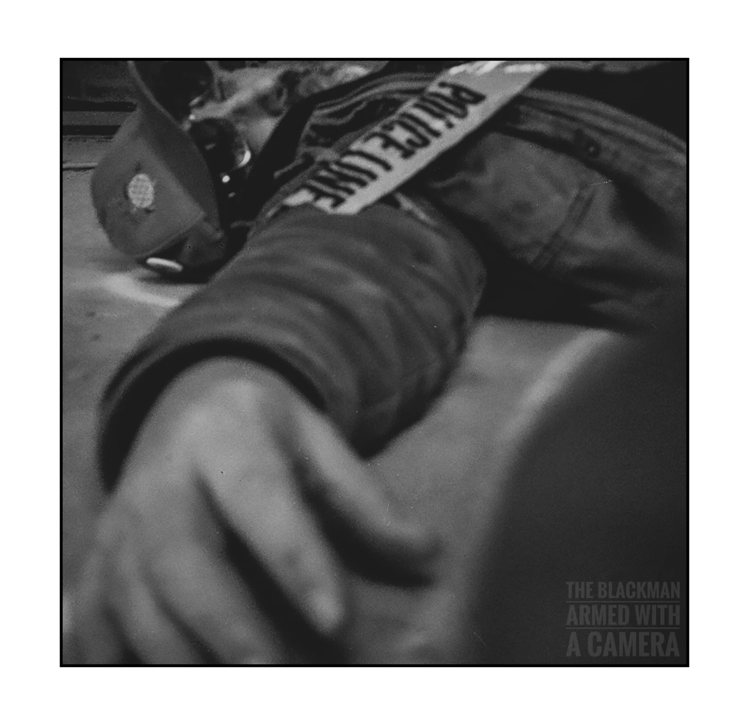 Dead Bum Found Lying On The Floor shot on Ilford HP5 Plus 400 with a Olympus Pen EE Half Frame, by THE BLACKMAN ARMED WITH A CAMERA
