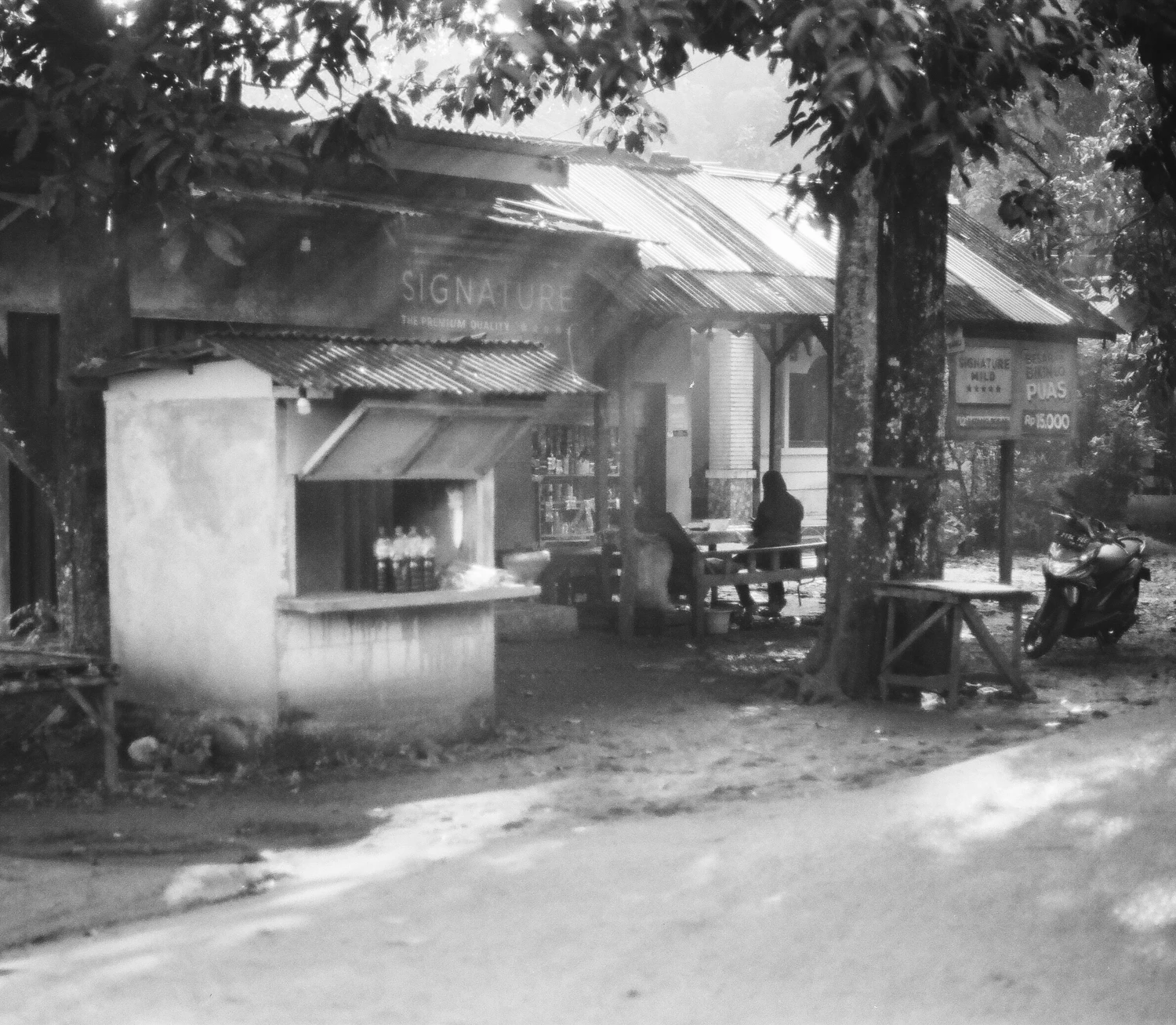 Traditional Kiosk shot on Ilford Kentmere Pan 100 with a Canon TLB, by Haryanto