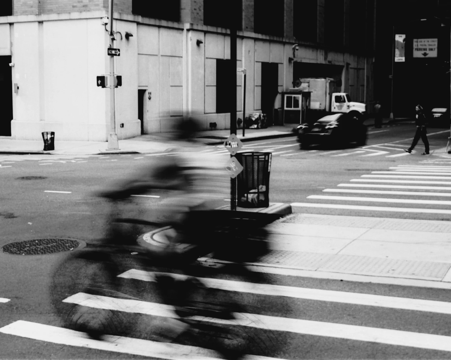 Long Exposure Bicyclist shot on Rollei RPX 25 with a Canon AE-1, by Michael Trimboli
