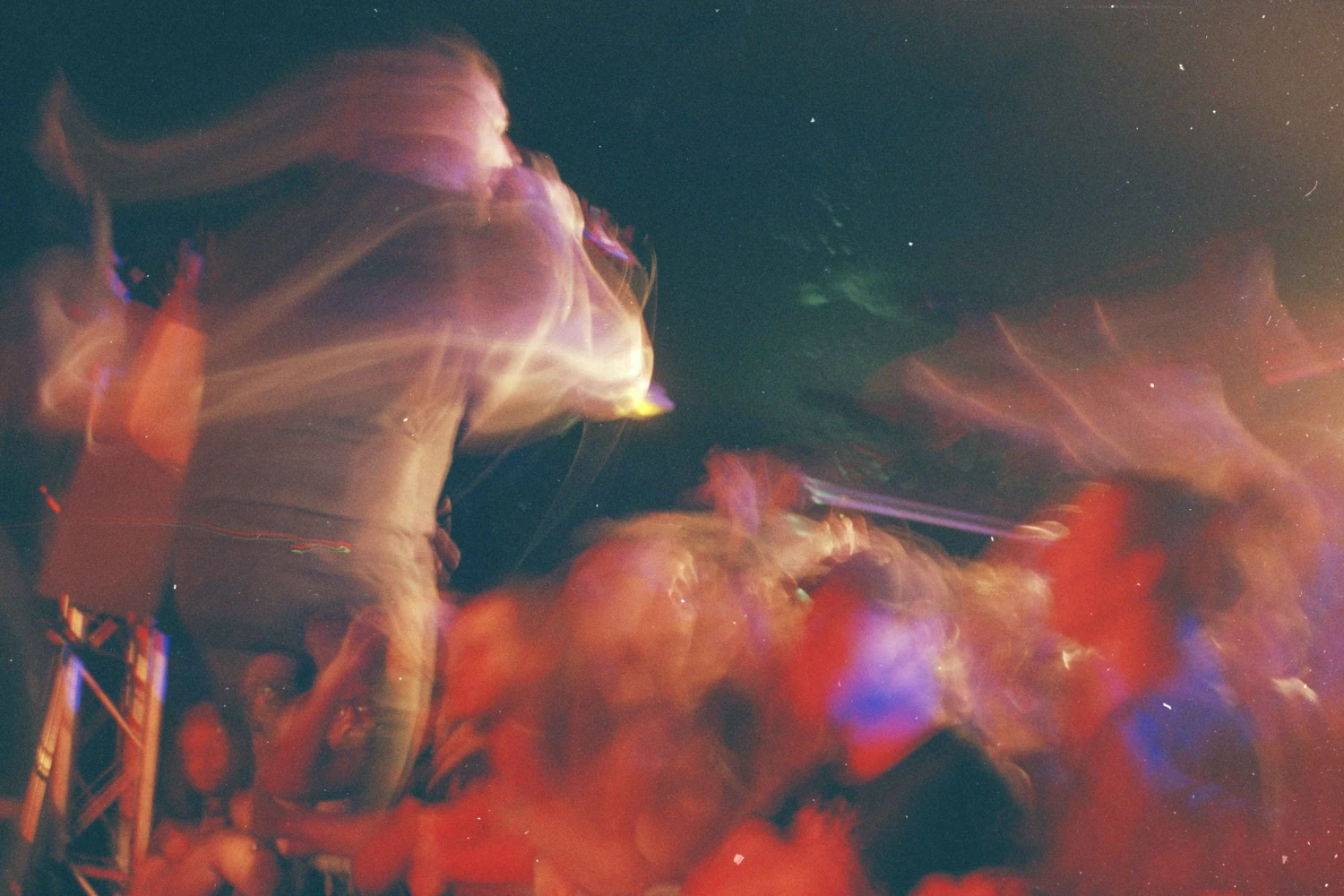 A blurry metal gig in Paris shot on Fujifilm Superia X-TRA 400 with a Smena 8M, by Dinography