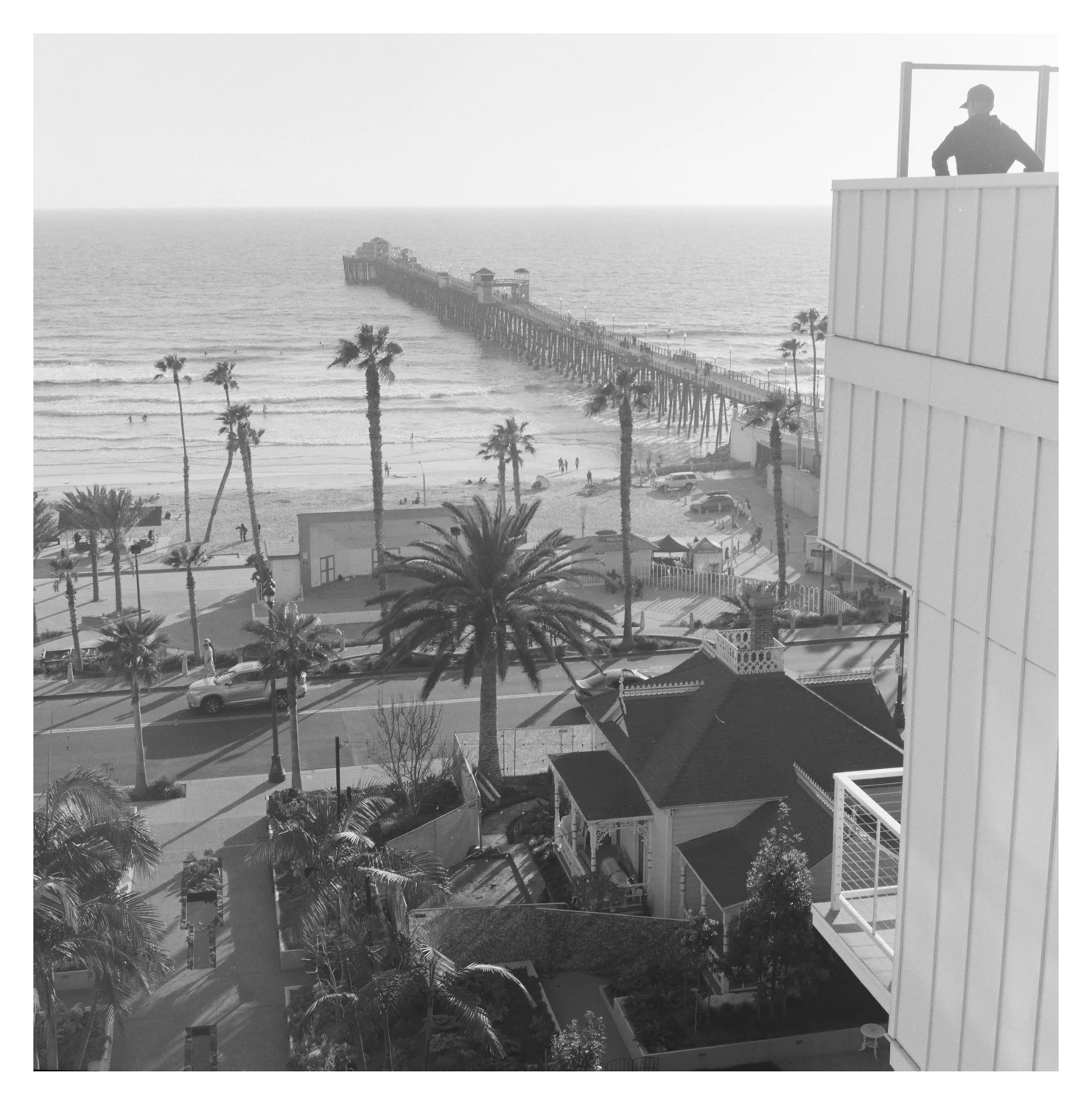 Oceanside pier from above shot on Ilford HP5 Plus 400 with a Yashica Mat EM, by Sam Cuzzone