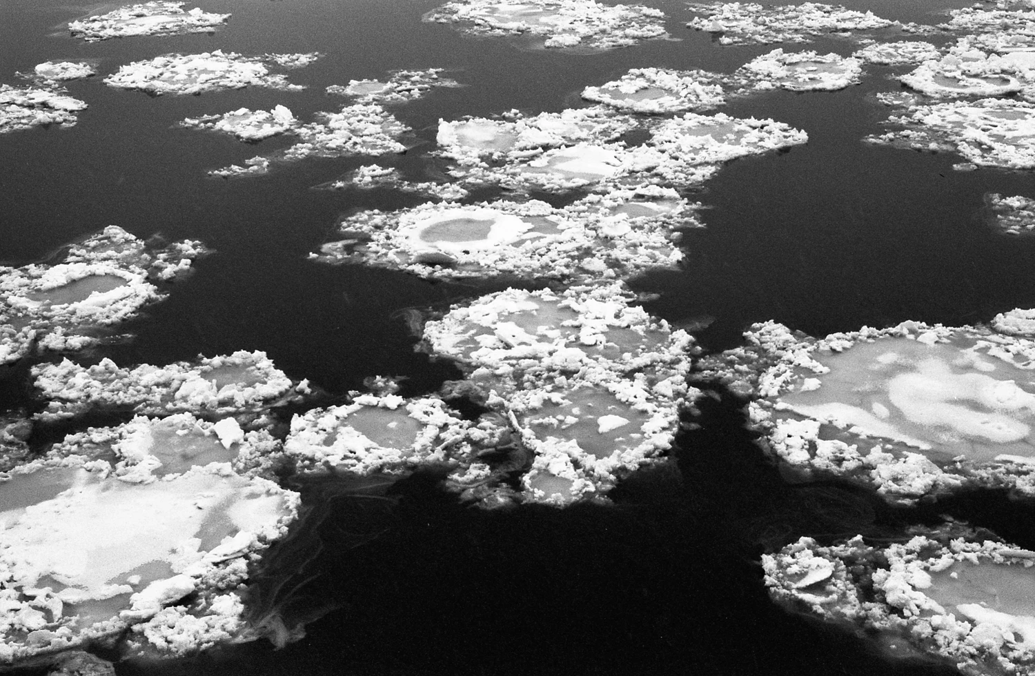 Ice on the water shot on Silberra U400 with a Minolta XG-M, by Sasha Avis