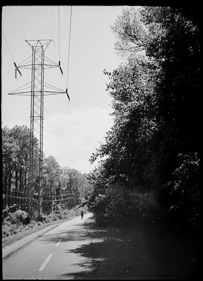 alone on the trail shot on Ilford HP5 Plus 400 with a Fujica Half, by mollylovesphotography