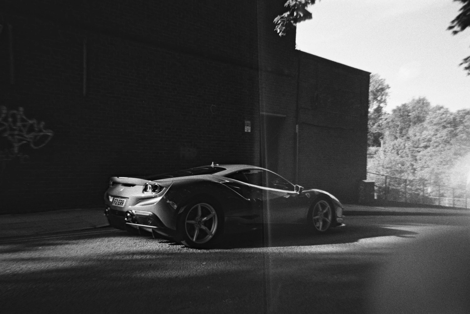 Ferrari F8 shot on Ilford Kentmere Pan 400 with a Harman Reusable Camera, by Devon R