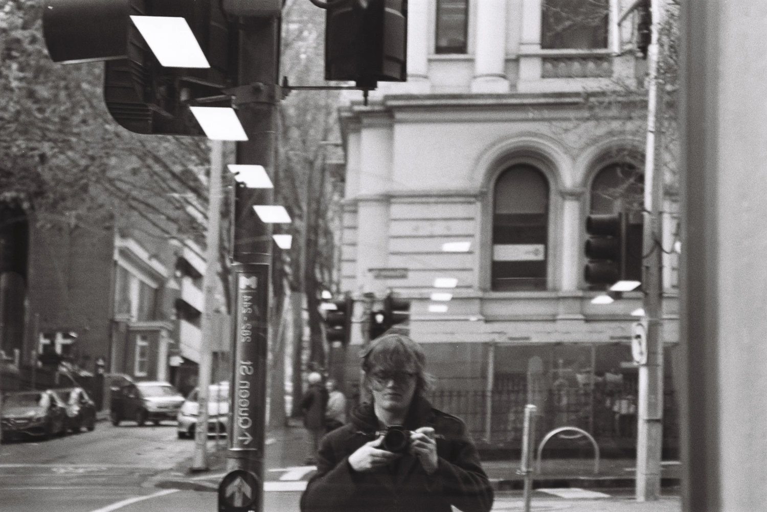 Self portrait shot on Ilford HP5 Plus 400 with a Pentax Z-10, by Jake