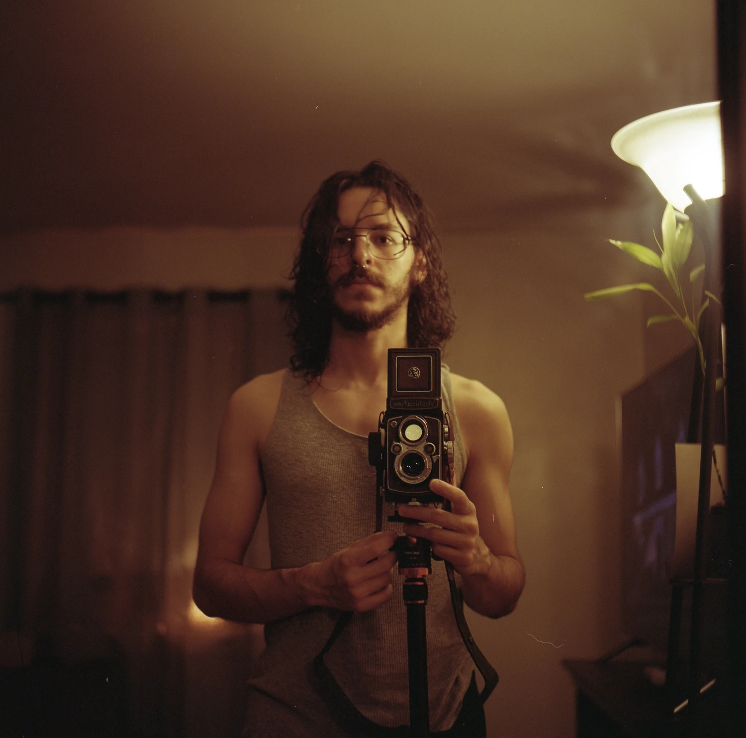 Self portrait shot on Kodak Portra 400 with a Yashicaflex, by Issac