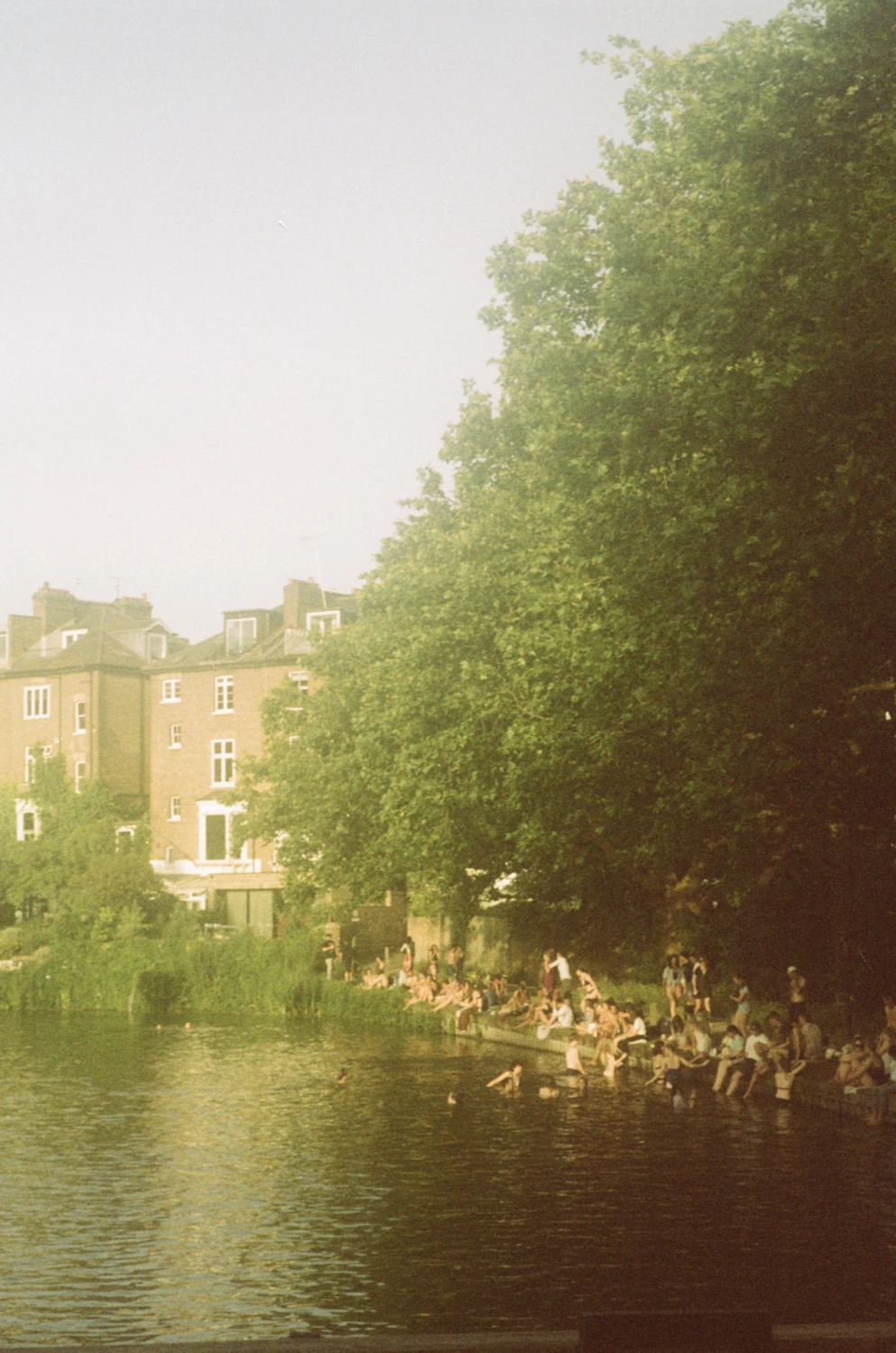 36 degrees and Illegal swimming shot on Fujifilm FujiColor C200 with a Pentax Espio Zoom, by Ella O’Brien