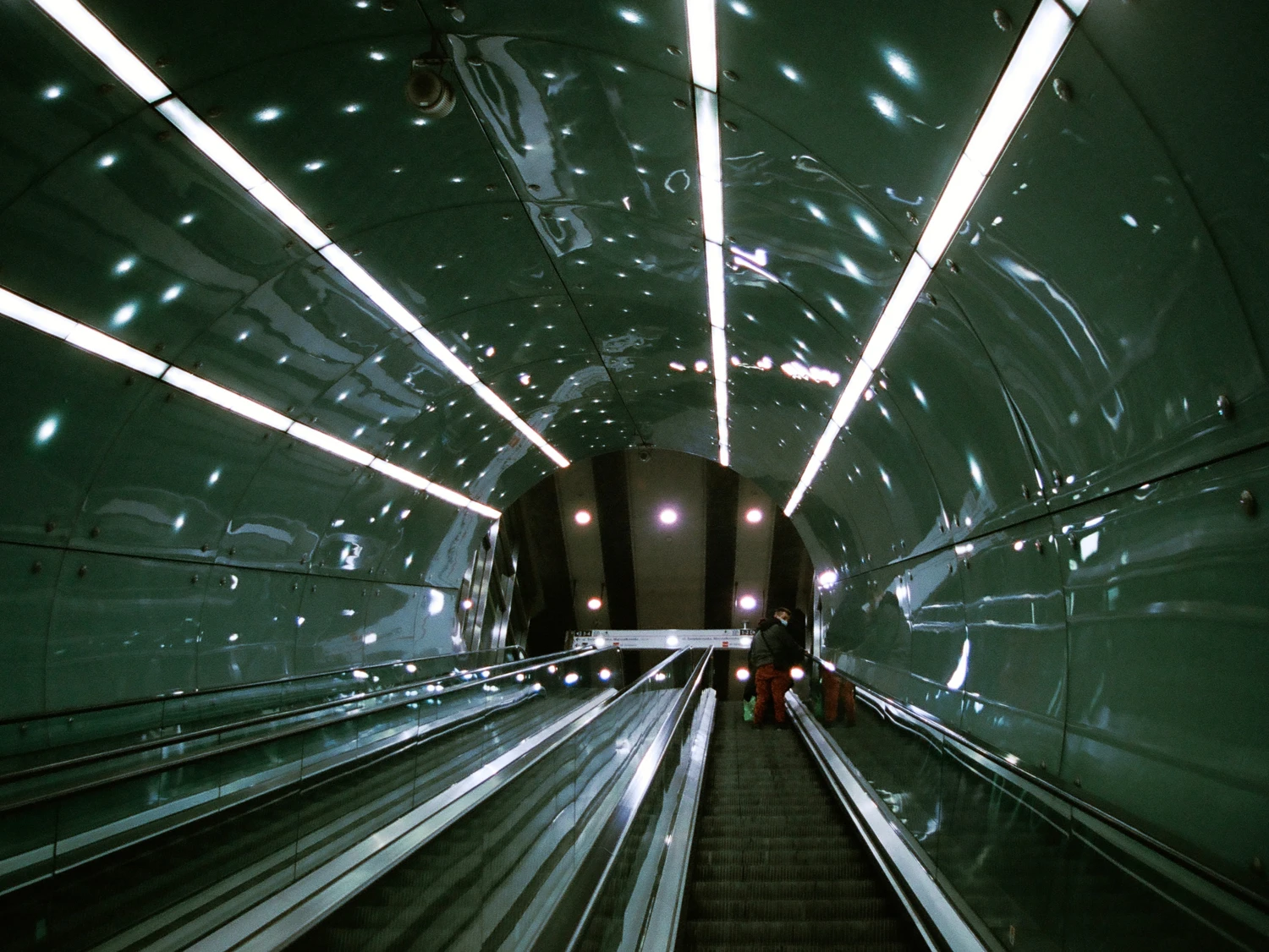Escalator Ride shot on Kodak Portra 400 with a Minolta AF9000, by Mikołaj Bańka