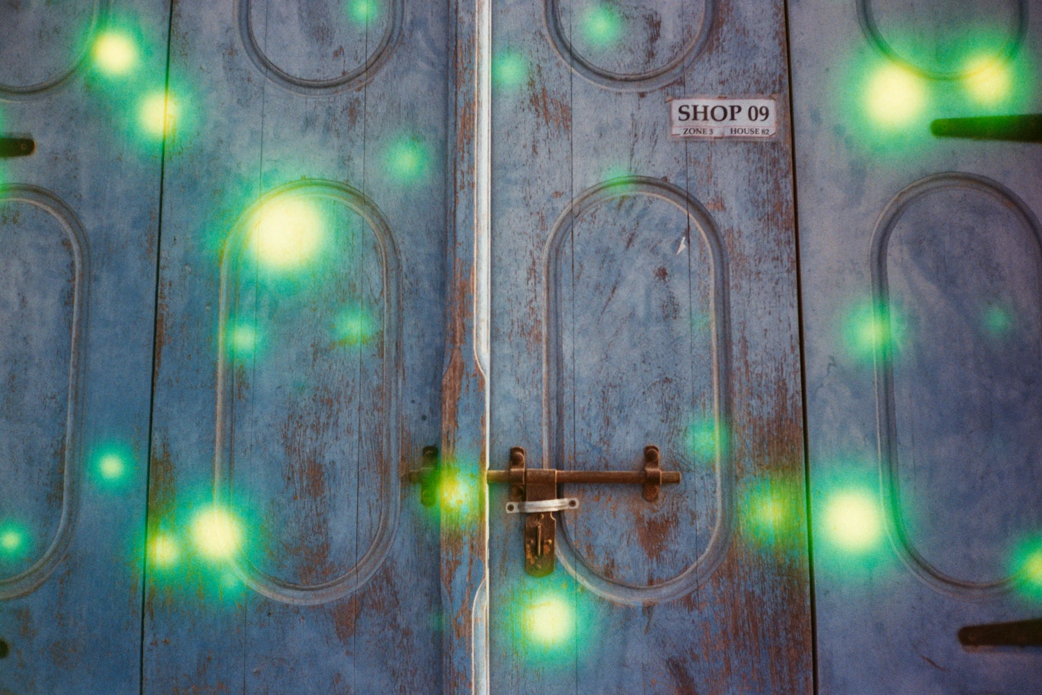 Old Shop Door shot on Revolog Volvox 200 with a Olympus AF-10 XB, developed at Khalifa Art Center, by Ri