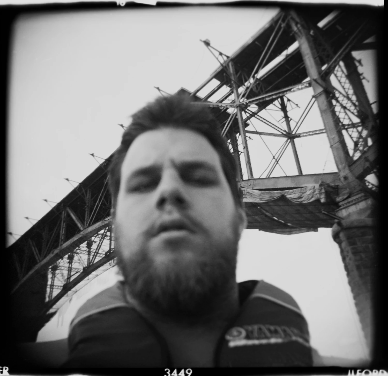 Self portrait on the Tennessee River circa 2002. shot on Ilford XP2 Super 400 with a Holga, by Cary Norton