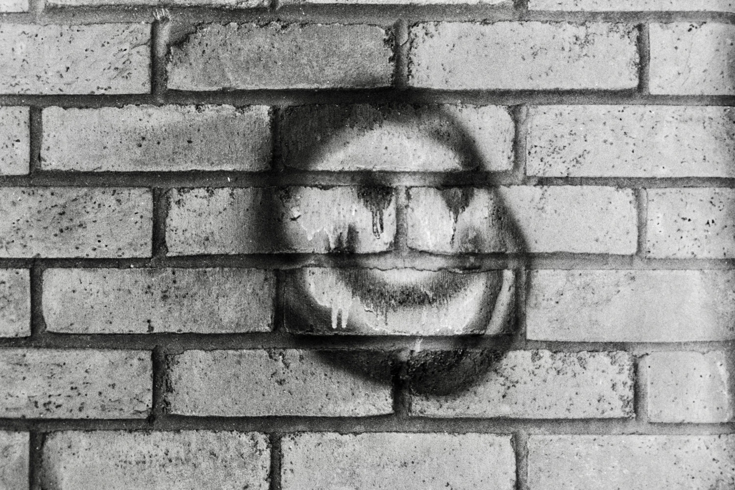 Smile shot on Ilford Kentmere Pan 400 with a Minolta Hi-Matic 7s, by iamdanbarber