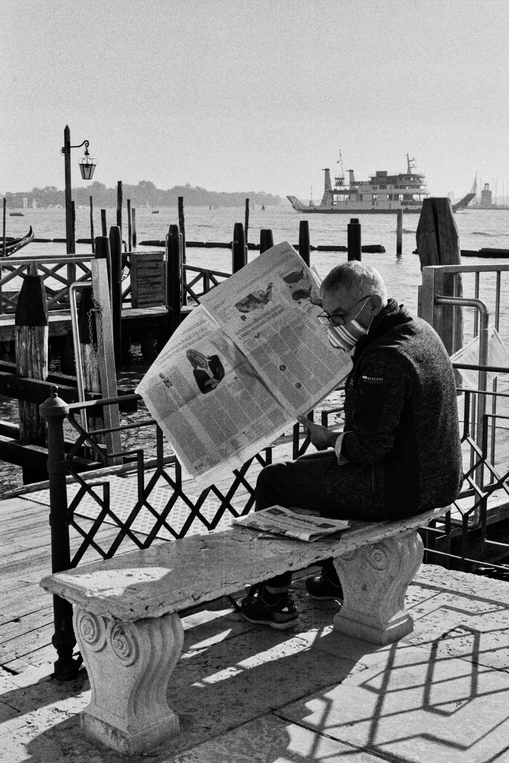 The Sunday newspaper shot on Ilford HP5 Plus 400 with a Canon T50, by Rebecca Abinti