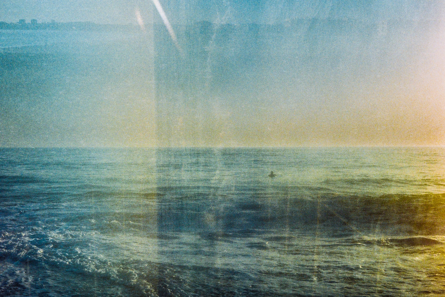 an ocean swimming in another ocean shot on Kodak ColorPlus 200 with a Yashica Electro 35 GX, by oblivion