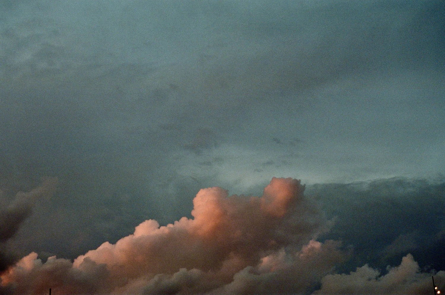Clouds Over The City shot on Fujifilm Pro 400H with a Yashica FX-7, by Don