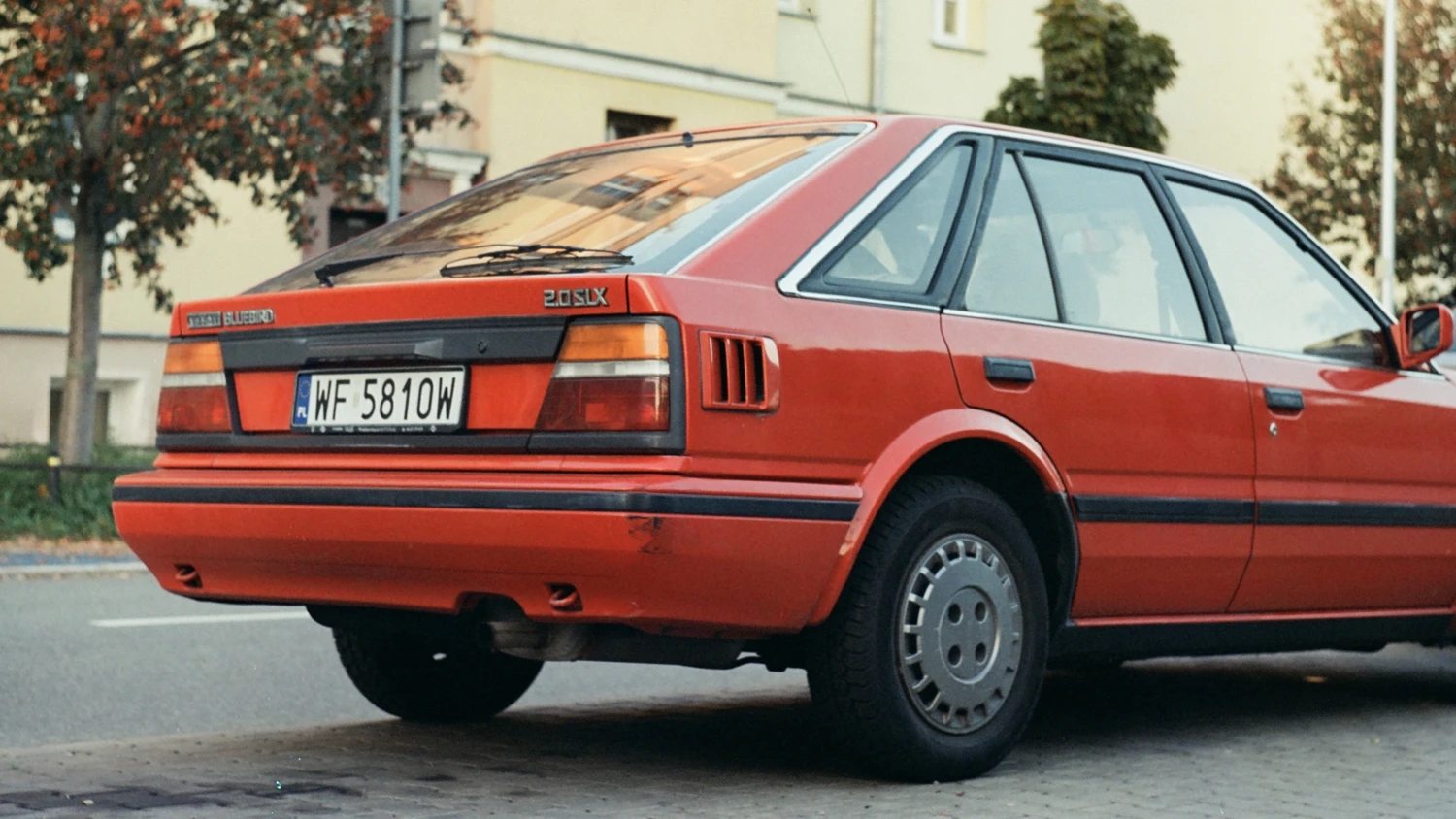 Nissan Bluebird shot on Kodak Vision 3 250D with a Zenit ET, developed at Czarno-Białe, by Gost