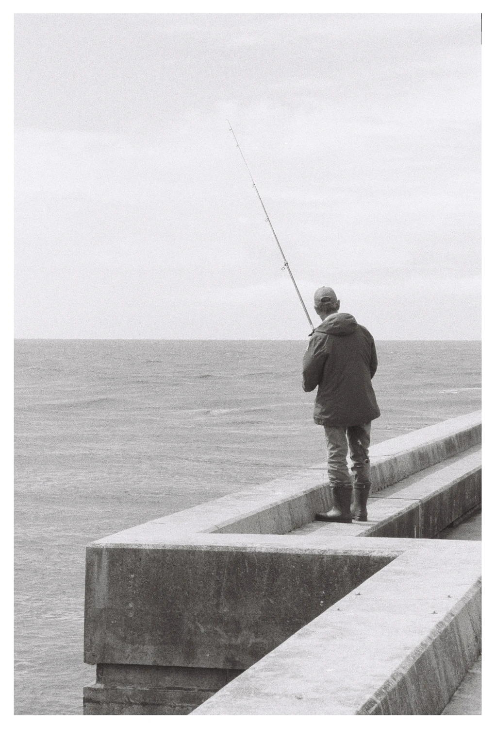 Fisherman shot on Agfa APX 400 with a Rollei Prego 160, by António Teixeira