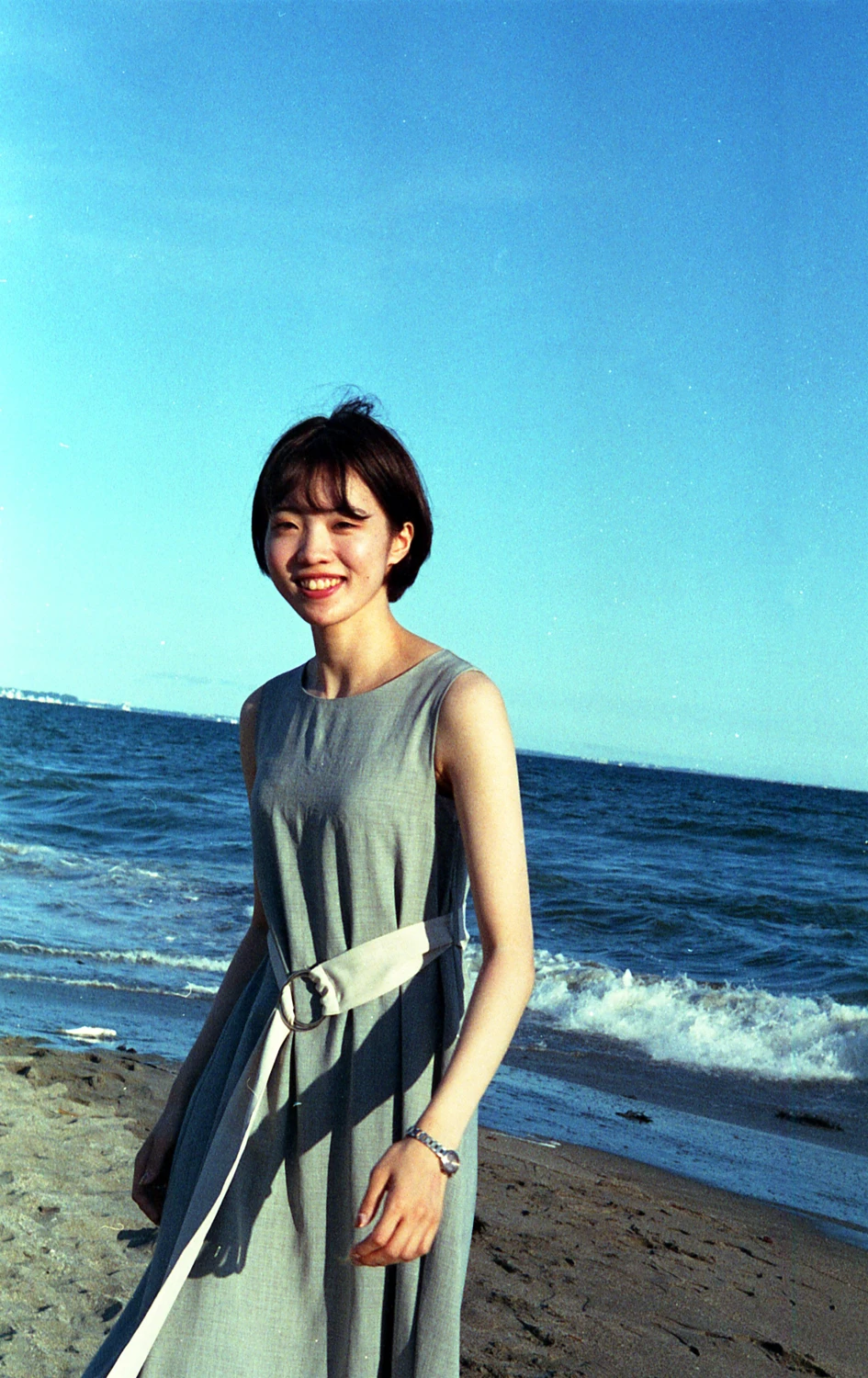 Happy Natsumi shot on Fujifilm Superia Premium 400 with a Minolta Alpha 303si Super, by Salma