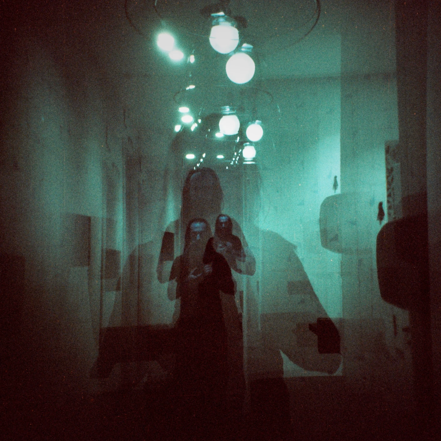 Me Times Four shot on Lomography LomoChrome Turquoise 100 with a Holga, developed at Carmencita, by Christian Heidebur