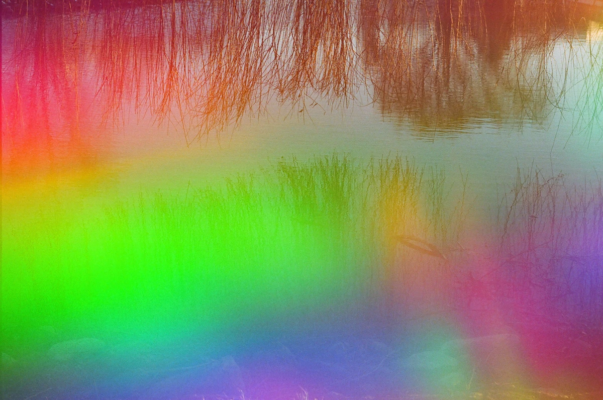 Rainbow Pond shot on Psychedelic Blues 400 #4 with a Canon Rebel 2000, by Katie Mollon